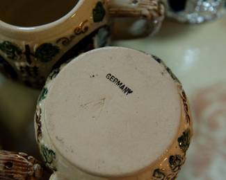 Bottom detail of a cup from vintage German punch bowl set with 12 cups, showing stamp that reads "Germany"