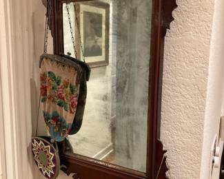 antique mirror and purses