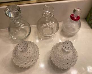 perfume bottles including Lalique in the foreground