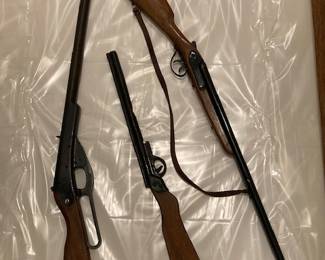 bb gun and two toy guns