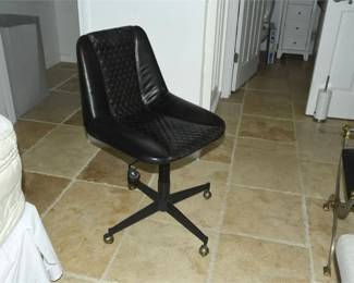 36. Quilted Leather Swivel Chair