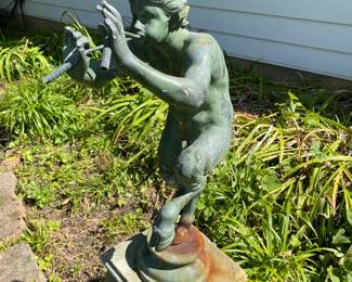 Cherub garden statue with flute