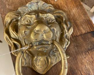 Brass lion door knocker