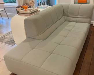 Seat height is 15". Super comfortable in light gray fabric.