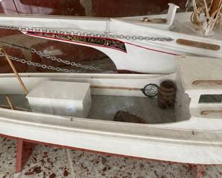 Larger boat is a model of the Skipjack "Rosie Parks." Read about her history here: https://cbmm.org/rosie-parks-skipjack-1955/