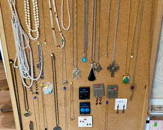 Classy costume jewelry…much more, especially earrings and pins..