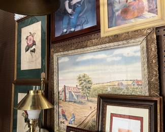Mix vintage & antique art for a designer gallery wall; add a brass lamp for some character and patina