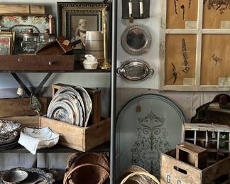 Add patina to your new home with inventory from designer's antique shop: baskets, rustic wood crates, carpenter tool boxes, silver plate, botanical prints