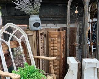 Antique and reproduction corbels + outdoor garden decor. Designer tip: bring the outdoor elements inside to add instant character and patina to your home!