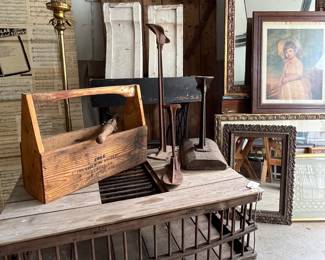 Chicken coop  / crate turned coffee table! Cast iron cobbler shoe molds, carpenter tool box, antique barn door w/ awesome hardware, antique mirrors, vintage art, large antique corbels.