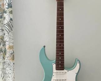 Yamaha Pacifica Electric Guitar played a few times but mostly wall decor. $165. Retail: $330. 