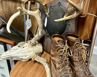 Antler mounts, vintage boots, vintage small chairs