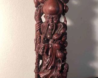 Carving Of Wise Man And Child