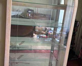 Collectors Cabinet By Howard Miller