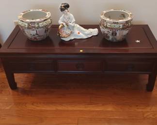 Rosewood cocktail table 125.00