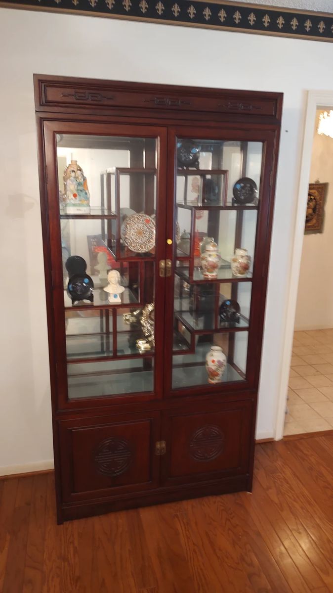 Rosewood display cabinet 300.00