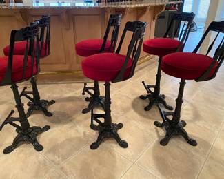 Fabulous set of 6 antique parlor swivel black laquered bar stools with red plush comfy cushioned seats and foot rest. Dimensions: Seat height 31". Back height 42".  Heavy and solid. 