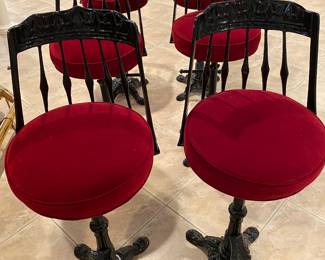 Fabulous set of 6 antique parlor swivel black laquered bar stools with red plush comfy cushioned seats and foot rest. Dimensions: Seat height 31". Back height 42".  Heavy and solid. 