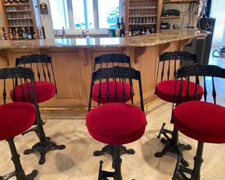 Fabulous set of 6 antique parlor swivel black laquered bar stools with red plush comfy cushioned seats and foot rest. Dimensions: Seat height 31". Back height 42".  Heavy and solid. 