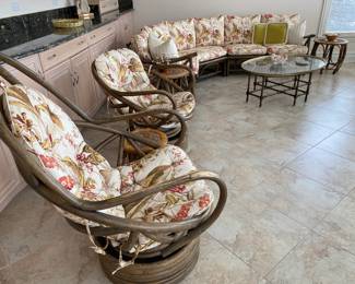 Rattan upholstered sofa/couch w/matching large and small rattan upholstered chairs.  Sold together or separately. Sofa dimensions: Width 32". Large chair: W 28" x D 33".  Small chair: W 30" x D 31".  See matching rattan coffee table with white top to this set in this sale. So pretty for sunroom/porch, too!