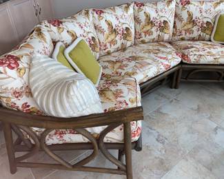 Rattan upholstered sofa/couch w/matching large and small rattan upholstered chairs.  Sold together or separately. Sofa dimensions: Width 32". Large chair: W 28" x D 33".  Small chair: W 30" x D 31".  See matching rattan coffee table with white top to this set in this sale. So pretty for sunroom/porch, too!