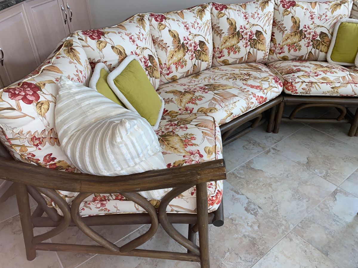 Rattan upholstered sofa/couch w/matching large and small rattan upholstered chairs.  Sold together or separately. Sofa dimensions: Width 32". Large chair: W 28" x D 33".  Small chair: W 30" x D 31".  See matching rattan coffee table with white top to this set in this sale. So pretty for sunroom/porch, too!