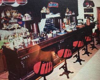 Fabulous set of 6 swivel antique black laquered parlor bar stools with red plush comfy cushioned seats and foot rest. Dimensions: Seat height 31". Back height 42".  Heavy and solid. 