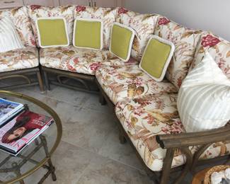 Rattan upholstered sofa/couch w/matching large and small rattan upholstered chairs.  Sold together or separately. Sofa dimensions: Width 32". Large chair: W 28" x D 33".  Small chair: W 30" x D 31".  See matching rattan coffee table with white top to this set in this sale. So pretty for sunroom/porch, too!