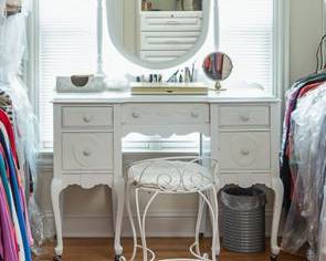 Pretty white painted vanity or dressing/make up table with mirror and drawers. 