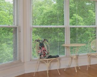 Yellow indoor/outdoor small patio/balcony table and chair set.