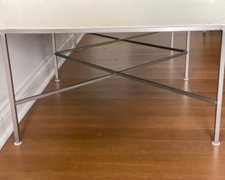 Designer leather bench with brushed metal base. Dimensions: Width 58" x depth 30" x height 21". Retail price was $3,675. 