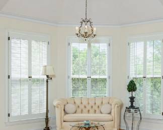 Floor lamp, loveseat and glass-top coffee/side/end table.
