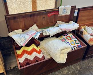 quilts and afghans and nice cedar chests 