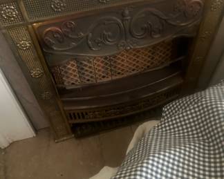 Gorgeous antique metallic fireplace screen dating back to 1898