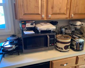 small kitchen appliances including Kitchen Aid Mixer on stand