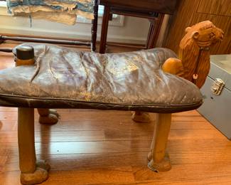Camel foot stool, leather with carved head