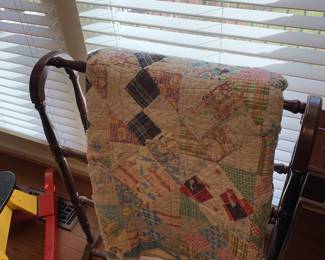 quilt rack and vintage quilt
