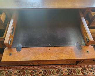 Front drawer opens to hold a keyboard