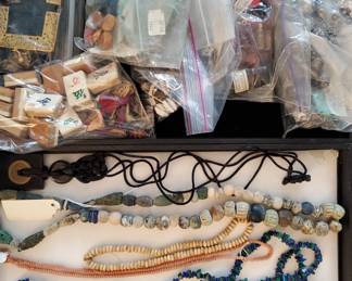 Only a small amount of jewelry. Plus a few bags of misc beads.