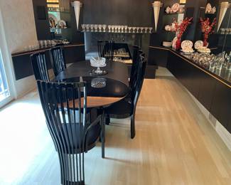Tonon Ebony laquer dining set.  Table features two removable leaves.  Shown with 1.