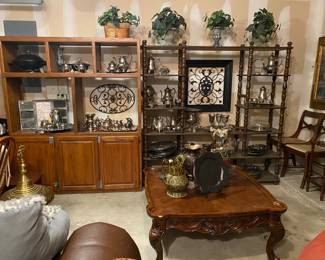 Lots of silver plated players pitchers and sauces on top of those two for sale wood pieces! The center table is solid wood and a beautiful piece to add to the center of your living space!