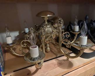 Beautiful gold brass chandelier ready to be hanged into a beautiful home!