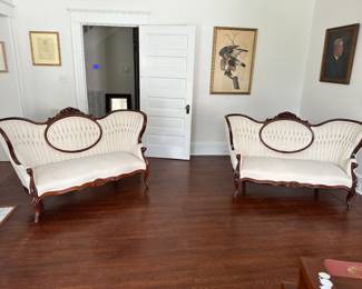 Pair of antique Victorian style sofas 