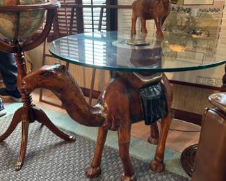 CARVED WOOD AND GLASS CAMEL TABLE - BUY IT NOW $350. Call or Text Patty at 847-772-0404 to arrange for purchase or make inquiries.