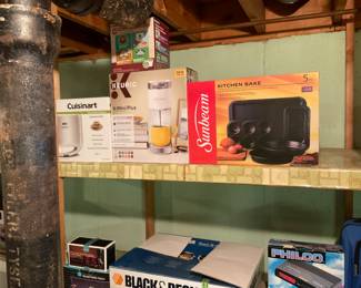 SHELF OF NEW HOUSEHOLD APPLIANCES