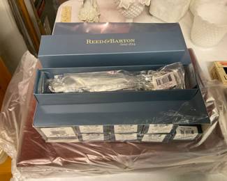 NEW IN THE BOX FLAT WARE.   