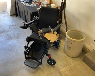 NEW WHEEL CHAIR. POWERED.   