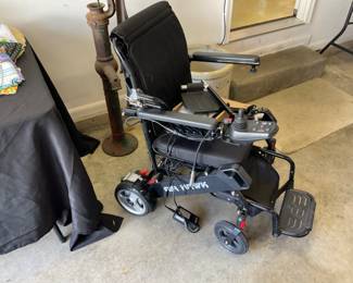 NEW POWERED WHEEL CHAIR.  WOW. MADE BY AIR HAWK.  