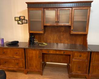 Great Office Desk with Hutch and has two matching filing cabinets.