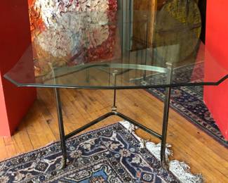 Glass top brass base dining table